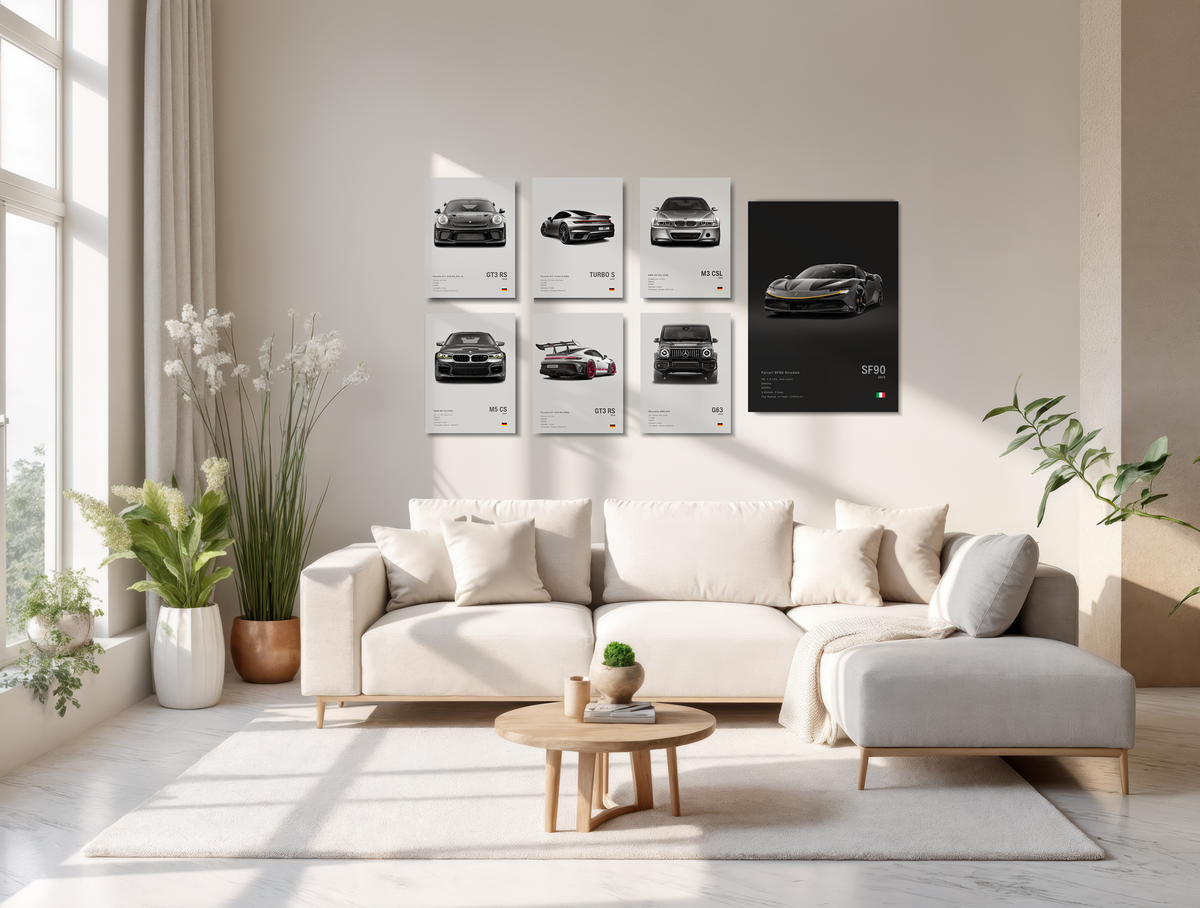 Modern living room with a white sofa, coffee table, and decorative car wall art.